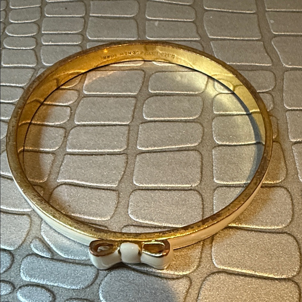 Set of three kate spade Gold, Purple, and Cream Bow Bangle Bracelets - Picture 5 of 6
